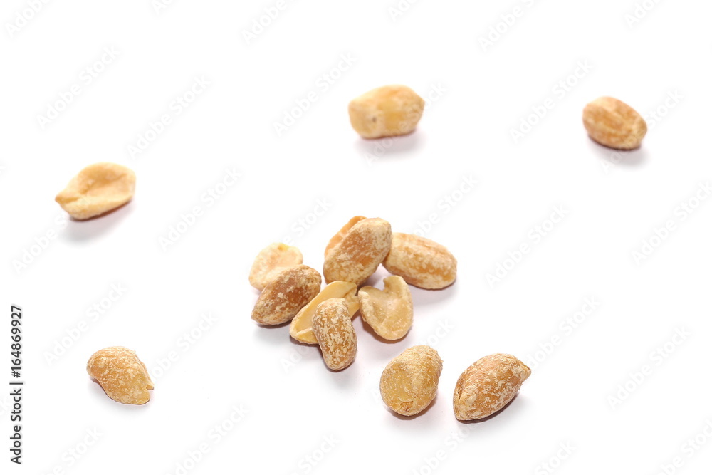 Pile salted fried peanut isolated on white
