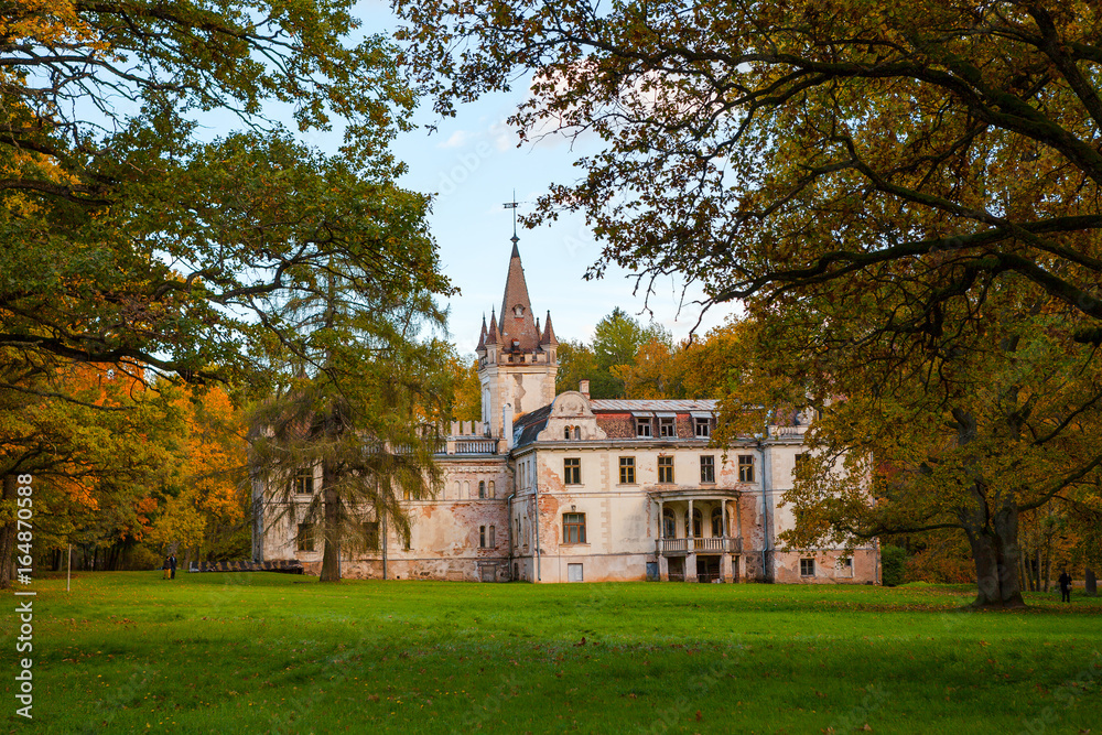 Old fairy-tale palace in Stameriena, Latvia. Fall time, bright colors.