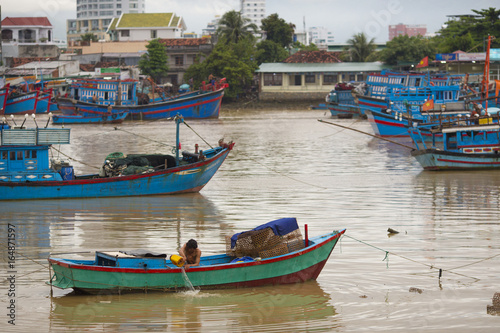 Tourist Junks and Floating village in Halong Bay 