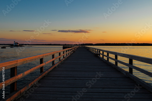 Walkway of a bridge at sunset andamanbangkokbaybeachbridgecolorfuldaydramaticduskharborhorizonislandlagoonlakelandscapemainemaldivesmarinamorningmotorboatnaturenew hampshirenightoceanoverparadisepier © KelseyjPhotos