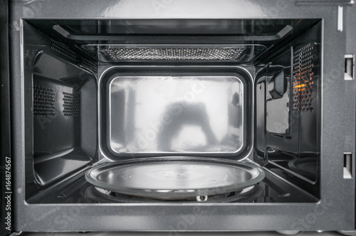 Konstfotografi Inside view of clean, empty microwave