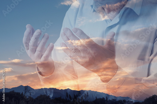 Praying for heaven. Religious man