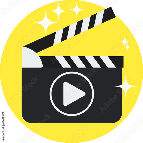 clapperboard on yellow