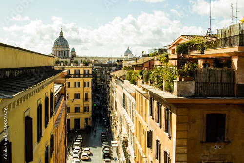Photography Sunlit terrace overlooking central Rome and the street below