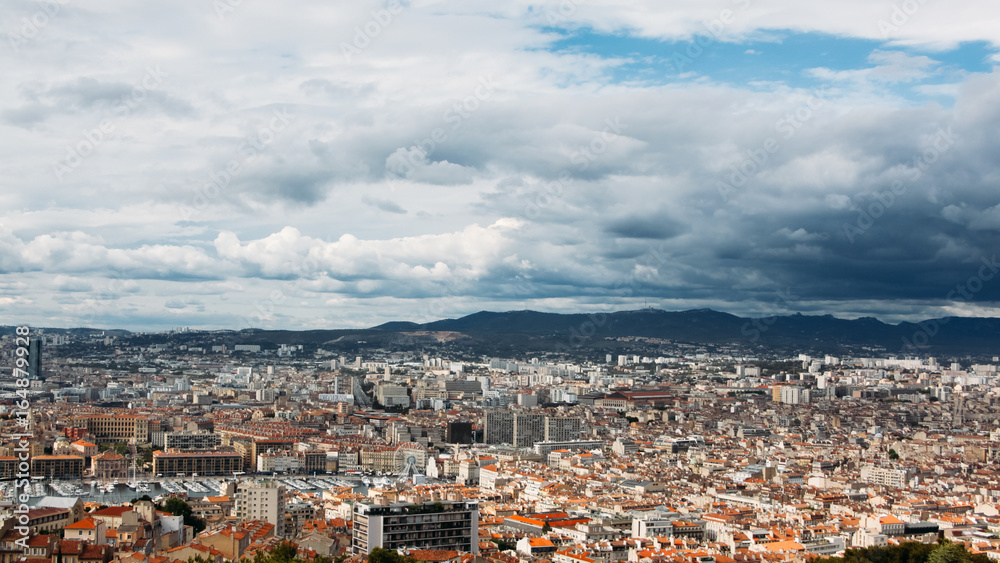 Old medieval Barcelona city from the bird's-eye view. Panorama. Sky. Clouds