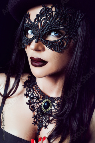 Girl in lace mask. The mask...