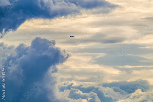 dark thunder clouds. Airpla...