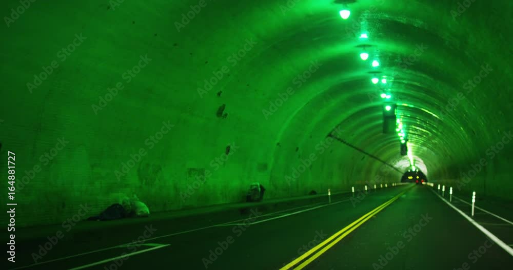 POV, driving through road tunnel POV, driving through road tunnel