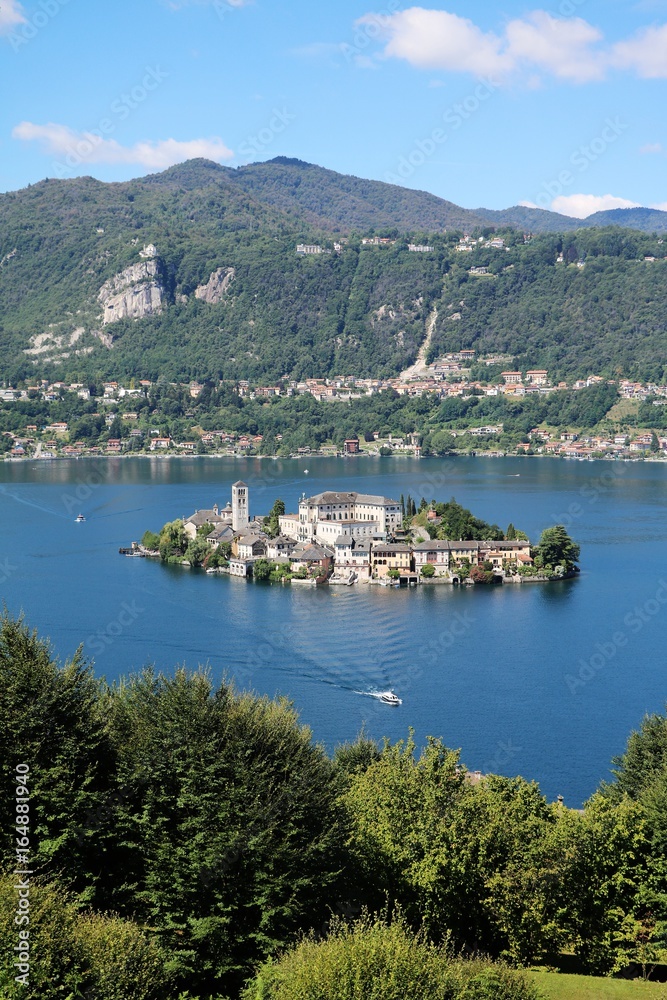 Viewpoint from Sacro Monte to Lake Orta and Isola San Giulio in summer, Piedmont Italy 