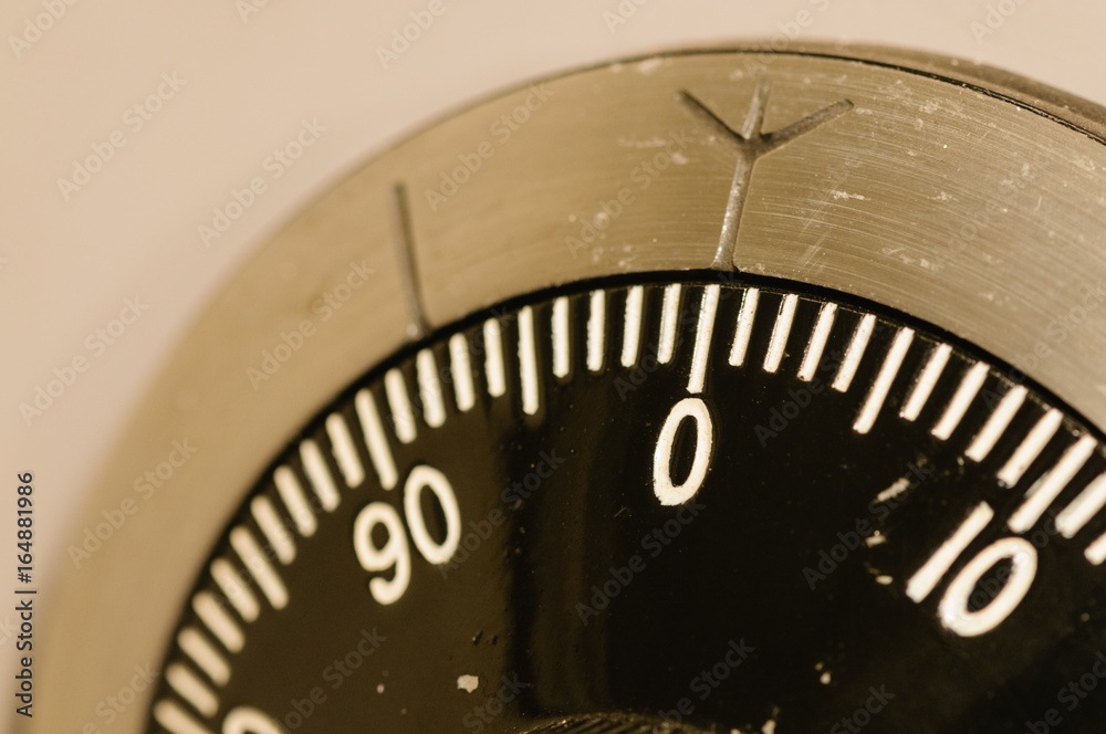 Closeup of a combination lock on a military-grade secure safe with the dial set to 0 Closeup of a combination lock on a military-grade secure safe with the dial set to 0