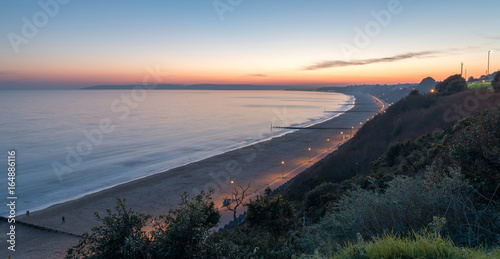Sun setting over Bournemouth beach