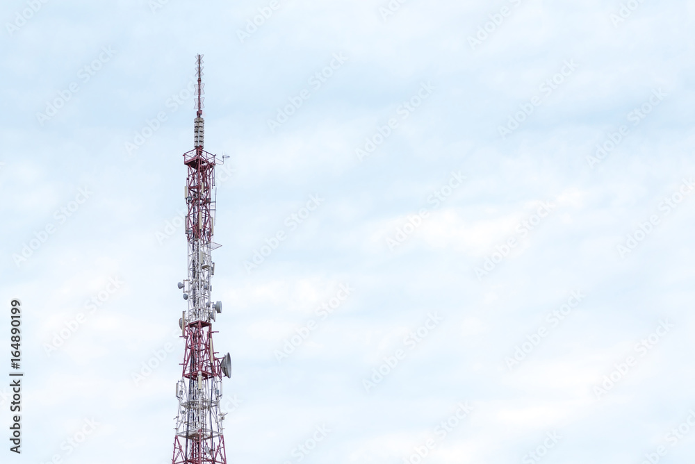 TV radio tower against cloudy sky