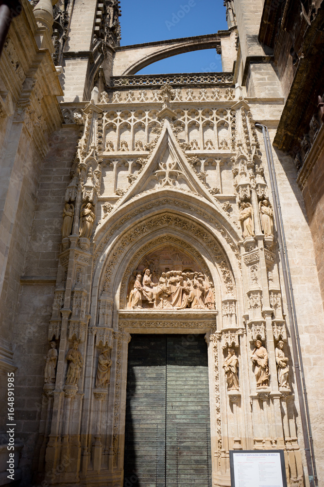 The Door of the gothic church in Seville, Spain, Europe