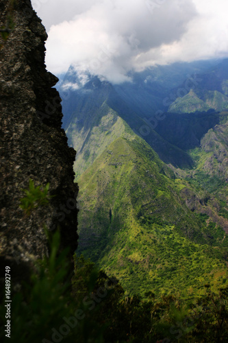 The volcanic tropical hills and valleys of Reunion Island, off the coast of Africa © Tod