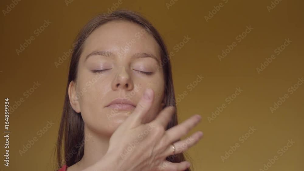Makeup artist working on model applying with brush base foundation liquid powder. Woman face painting. Cosmetic beauty procedures. 4K ProRes HQ codec Makeup artist working on model applying with brush base foundation liquid powder. Woman face painting. Cosmetic beauty procedures. 4K ProRes HQ codec