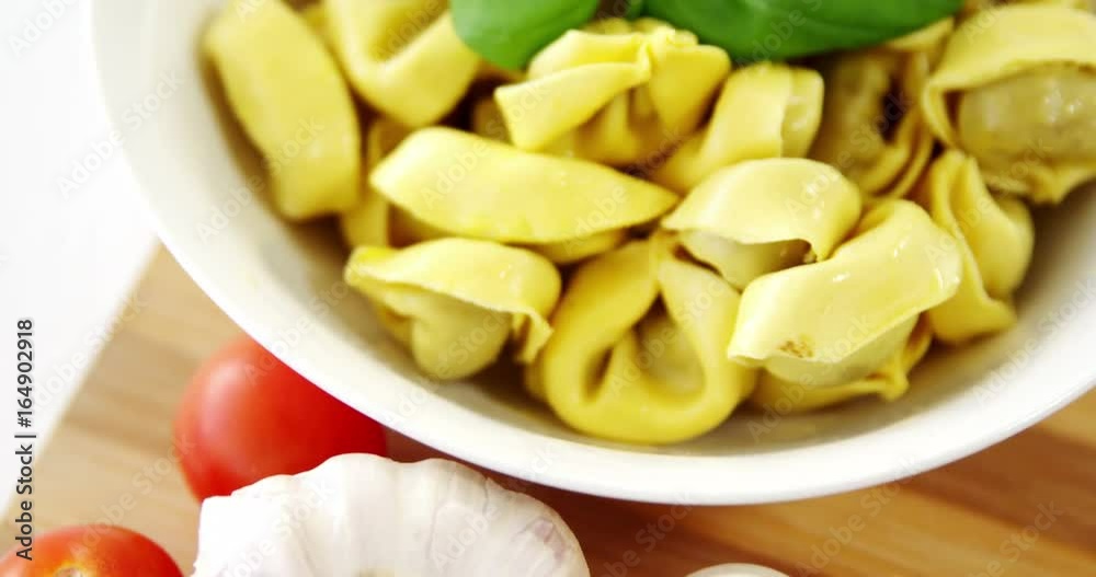 Garlic with bowl of pasta Garlic with bowl of pasta