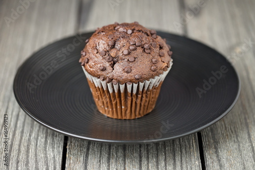 Chocolate Chip Muffin on Black Plate