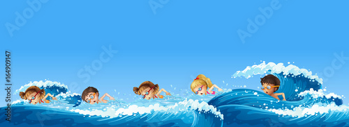 Many children swimming in the ocean