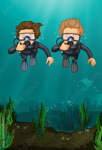 Two men scuba diving under the ocean