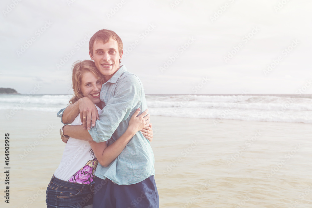 Couple people or tourist from europe with happy and relax time on the tropical beach at Karon, Phuket province, Thailand Couple people or tourist from europe with happy and relax time on the tropical beach at Karon, Phuket province, Thailand