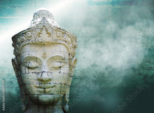 Abstract grungy old wall over white buddha head with smoke over vintage wall background