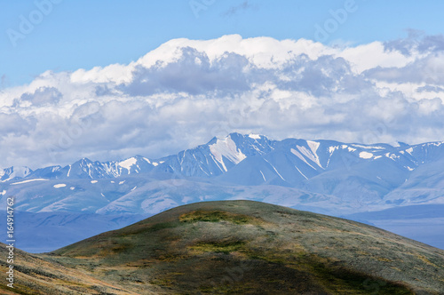 Perspective view of South-Kurai mountain chain with clouds photo