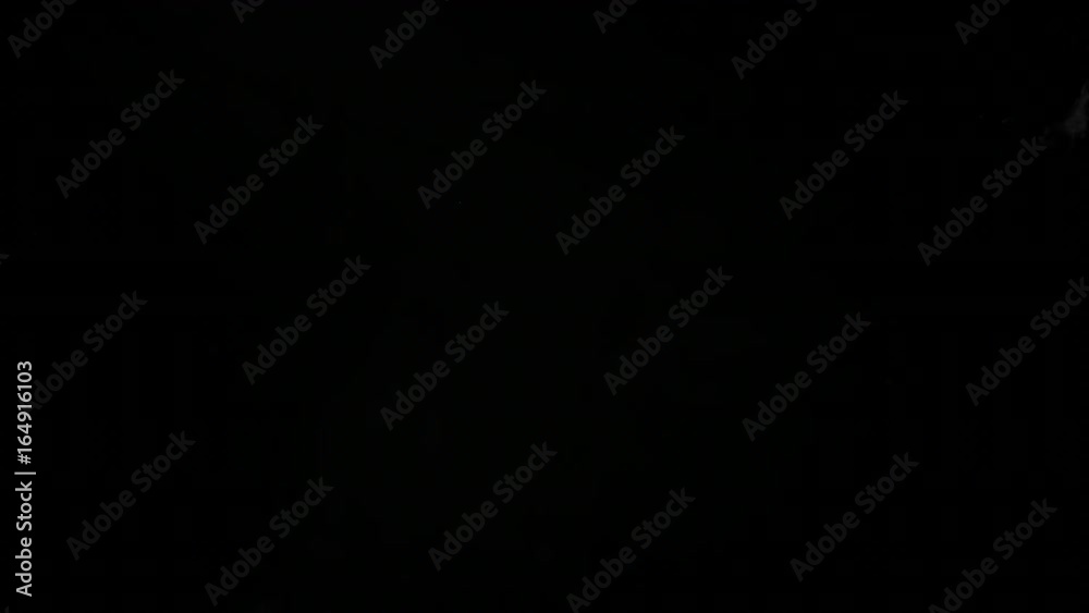 White water vapour on a black background. Close-up shot