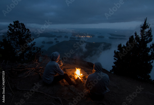 Enjoying view from top with campfire and islands in the front