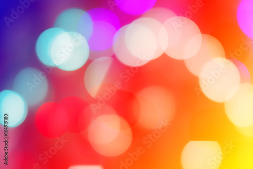Colorful abstract blurred circular bokeh light of night city street for background, graphic design and website template idea concept.