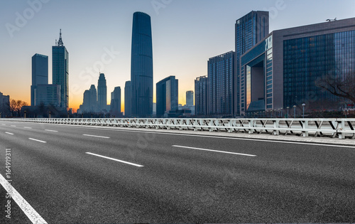 Empty downtown street intersection at sunrise/sunset,shot in Shanghai,China. © fanjianhua