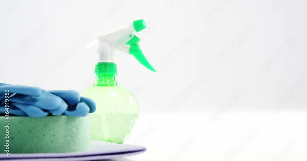 Cleaning sponge, gloves and spray bottle Cleaning sponge, gloves and spray bottle