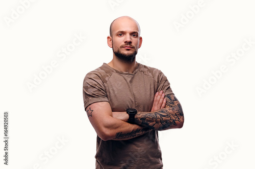 Fotografija Shaved head bearded male isolated on a white background.