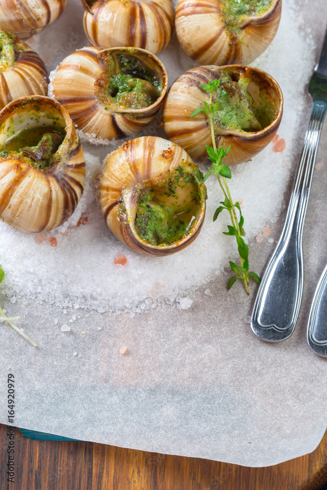 Baked snails with garlic butter and fresh herbs Baked snails with garlic butter and fresh herbs