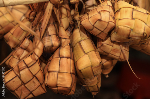 Ketupat - Rice wrap and cooked in coconut leaf bag weaving © AhmafNazri