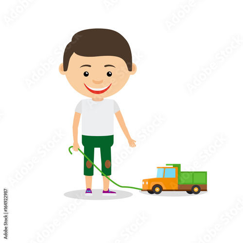 Little boy shows his toy car