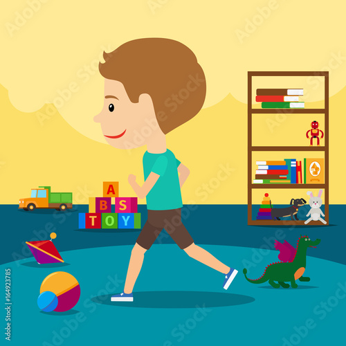 Boy runs around toys in kindergarten