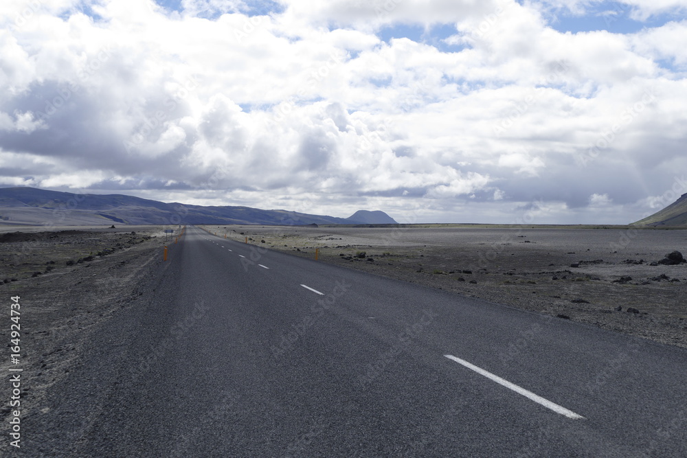 lonely road in a wild icelandic nature