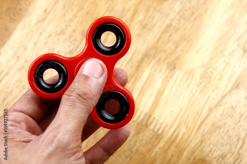 Hand holding a spinner