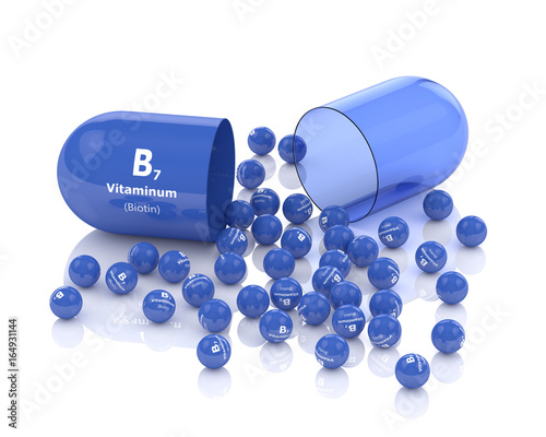 3d rendering of vitamin B7 pill with granules photo