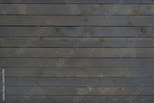 Fresh brown and black wooden boards, background texture