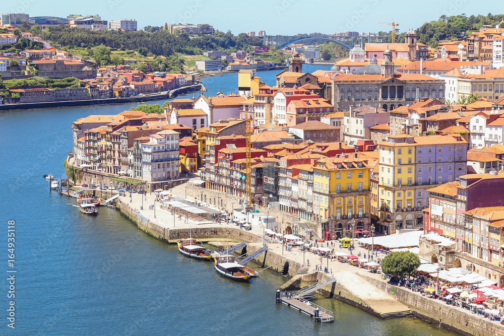 Panoramic view of river Douro and the Old town of Porto with colorful houses, Portugal