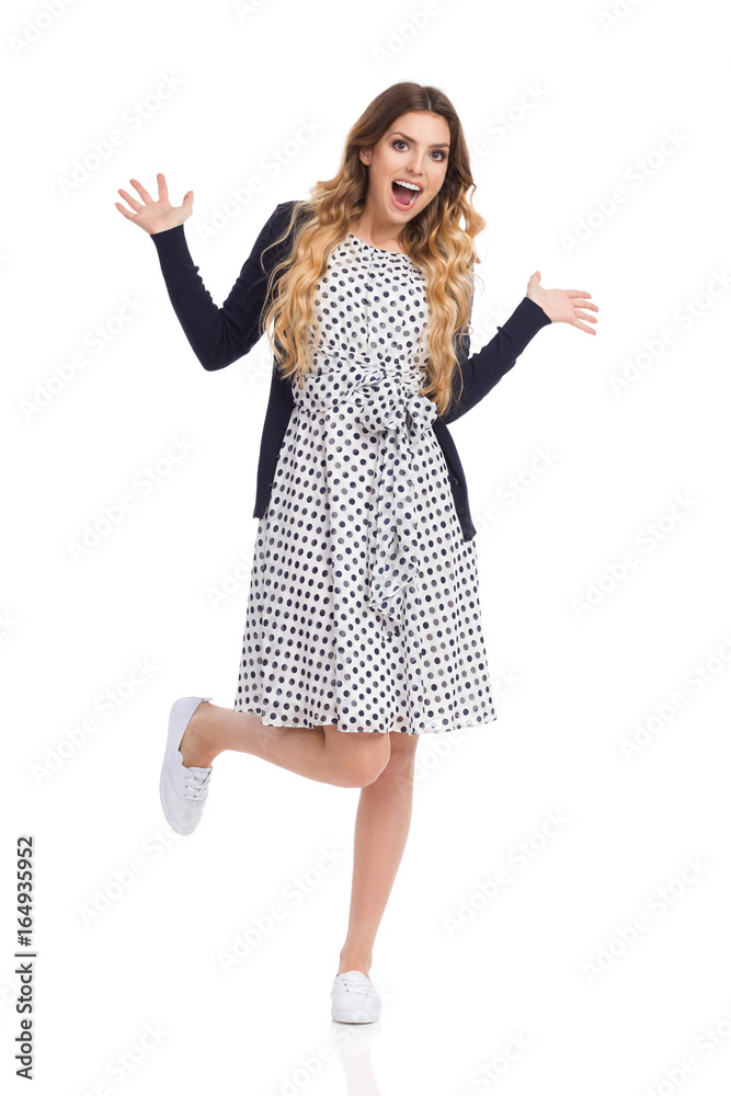 Laugjing Woman With Arms Outstretched Is Standing On One Leg Laugjing Woman With Arms Outstretched Is Standing On One Leg