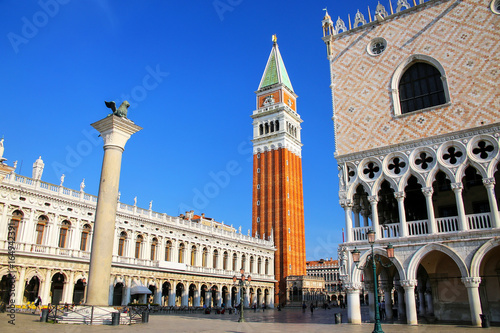 Piazzetta San Marco with St Mark's Campanile, Lion of Venice statue and Palazzo Ducale in Venice, Italy © donyanedomam