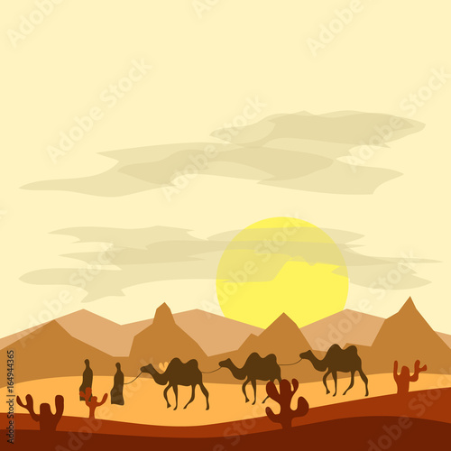 Caravan of camels in the desert, Bedouins lead camels through the desert