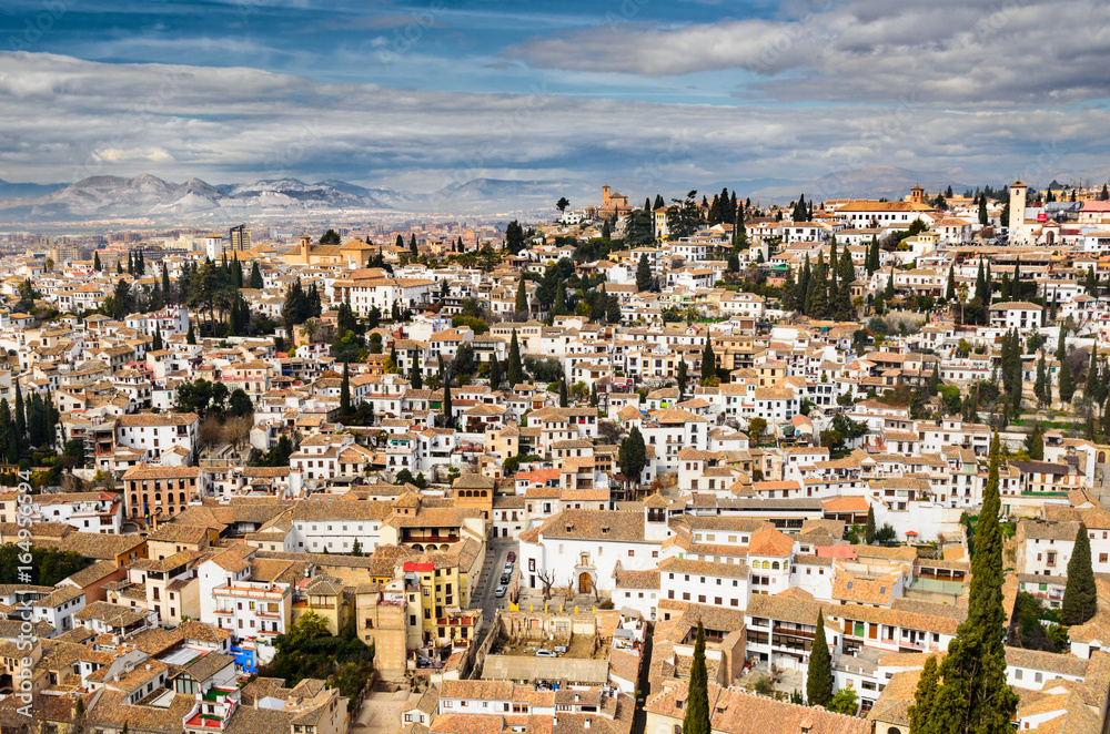 Panoramic view of Granada city against mountains, Andalusia, Spain