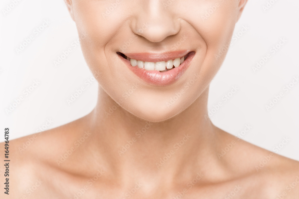 cropped view of beautiful woman biting lip, isolated on white cropped view of beautiful woman biting lip, isolated on white