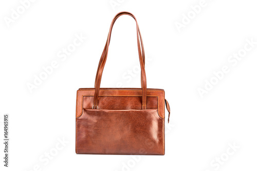 Elegant brown leather woman's handbag isolated on white background. 