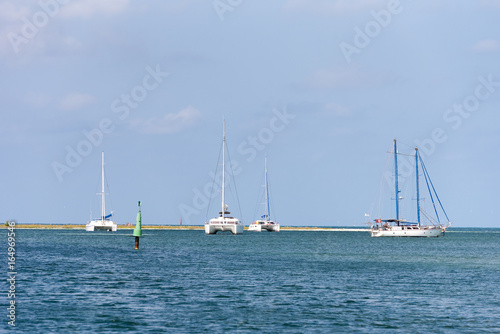 White yachts near the shore of the island of Cayo Largo  Cuba. Copy space for text.