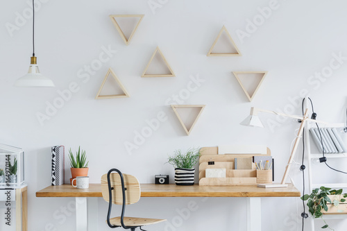 Scandi interior with triangle shelves photo