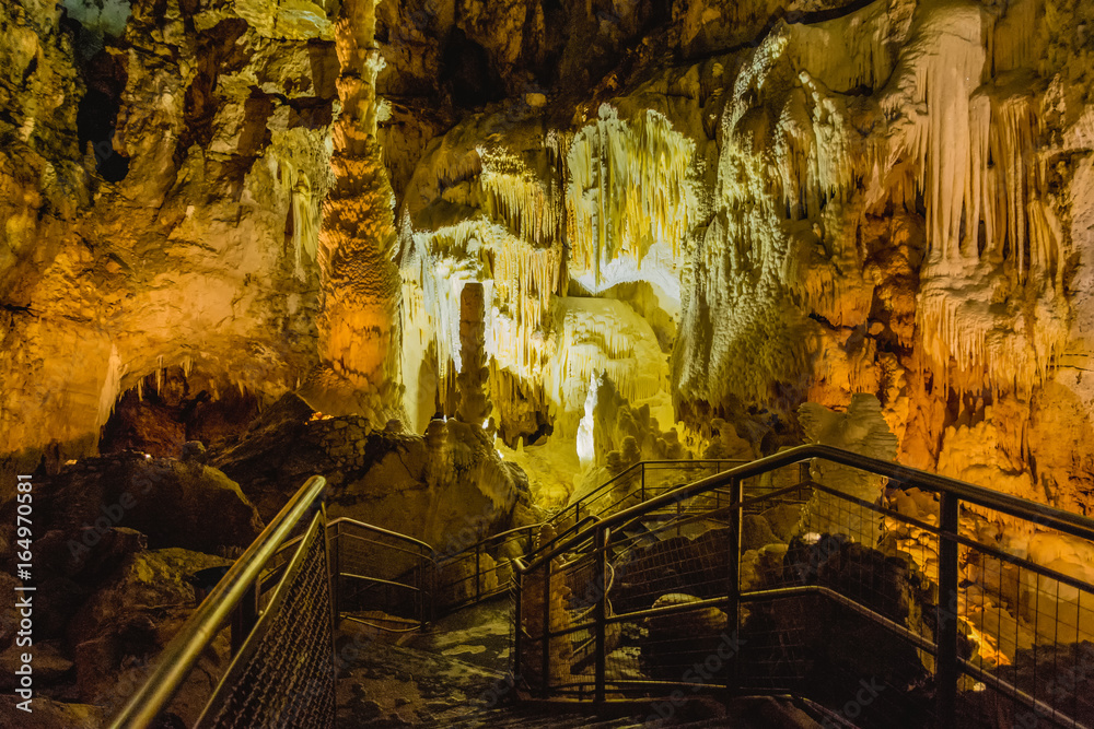 Fototapeta premium Formation of stalagmites and stalactites in the caves of Frasassi, Italy